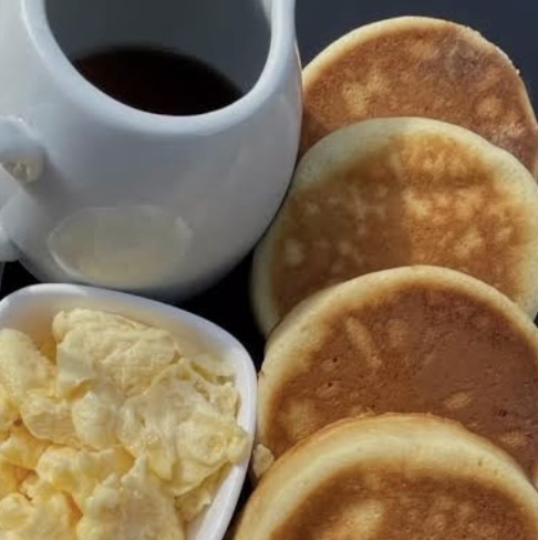 Fluffy Pancakes Served With Sausage and Tea
