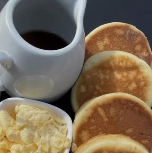 Fluffy Pancakes Served With Sausage and Tea/coffee