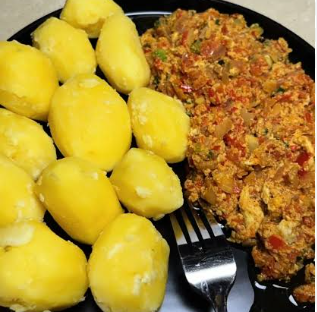 Boiled potatoes and egg sauce