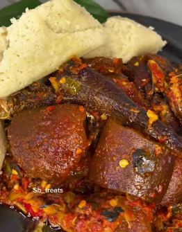 Ekuru with agidi and pepper sauce (kpanla, ponmo, locust beans included)