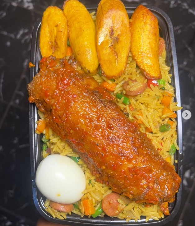 Jollof Rice + Fried Rice Combo with Turkey, boiled egg, plantain & 1 soft drink