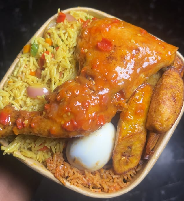 Jollof Rice + Fried Rice Combo Protein, boiled egg, plantain & 1 soft drink
