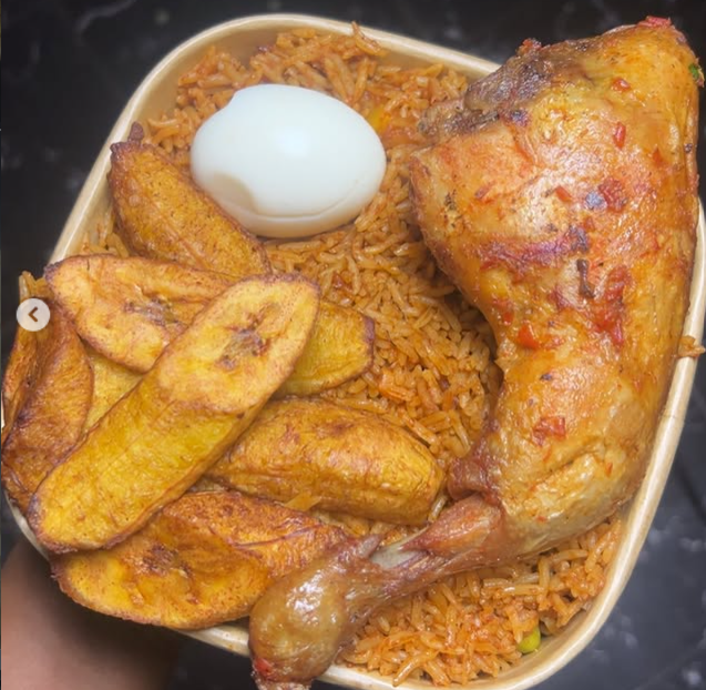 Smoky basmati Jollof Rice with Turkey, boiled egg, plantain & 1 soft drink