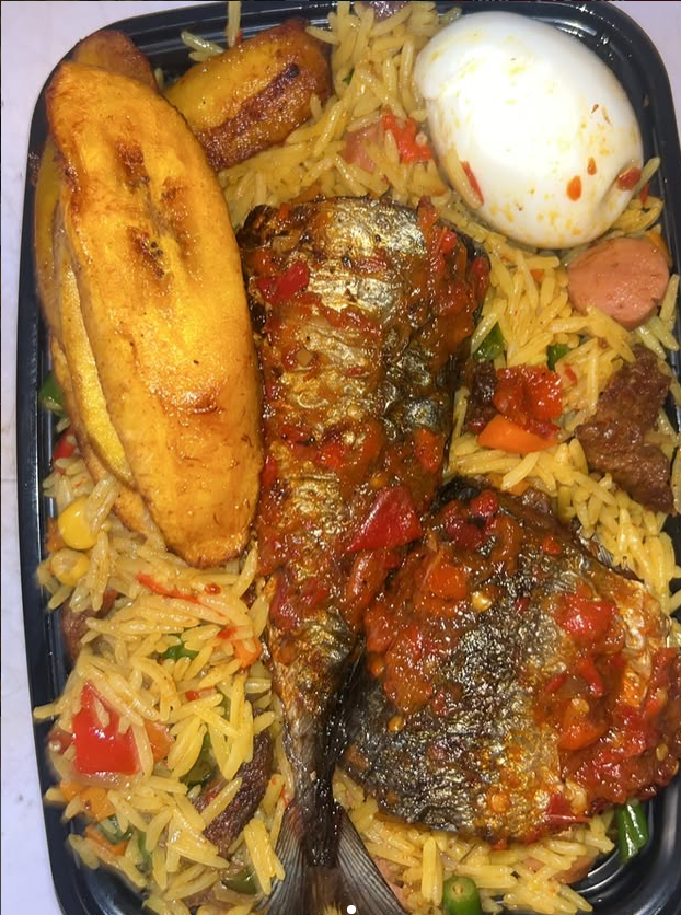 Spicy Asun Jollof Rice with Protein, boiled egg, plantain & 1 soft drink