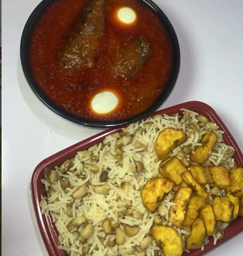 Rice and beans with Turkey stew, boiled egg and plantain