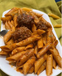 Penne with Chicken, boiled egg, plantain & 1 soft drink