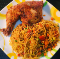 Jollof fusili  with Chicken, boiled egg, plantain & 1 soft drink