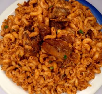 Jollof macaroni with Protein, boiled egg, plantain & 1 soft drink – ₦12,500