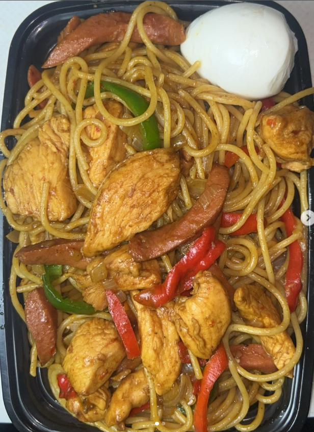 Stir fry spaghetti with chicken breast, sausage & vegetables with Protein, boiled egg, plantain & 1 soft drink