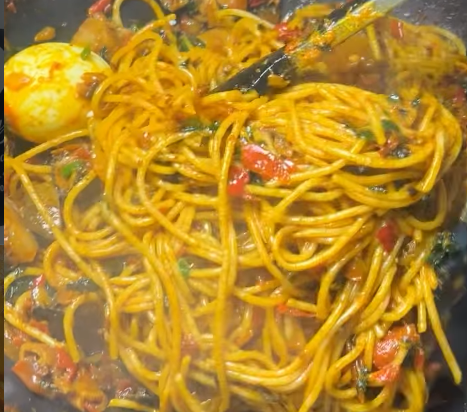 Native spaghetti with Kpanla, ponmo, dry fish, boiled egg and plantain with any protein