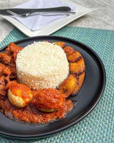 White Rice,Plantain,Goatmeat And Water
